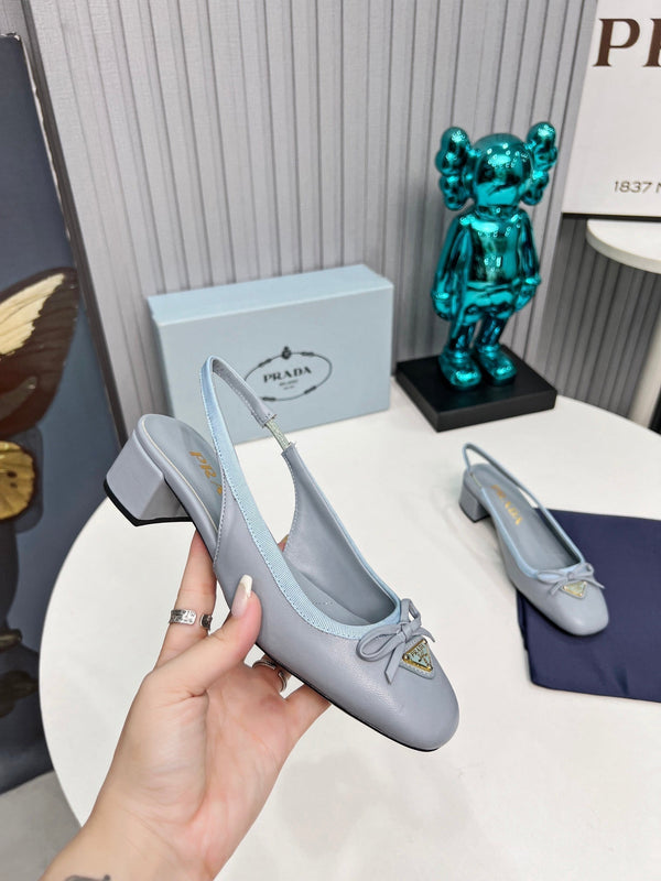 Prad 26s Round Toe Slingback Pumps 40mm In Light Blue Calfskin With Bow