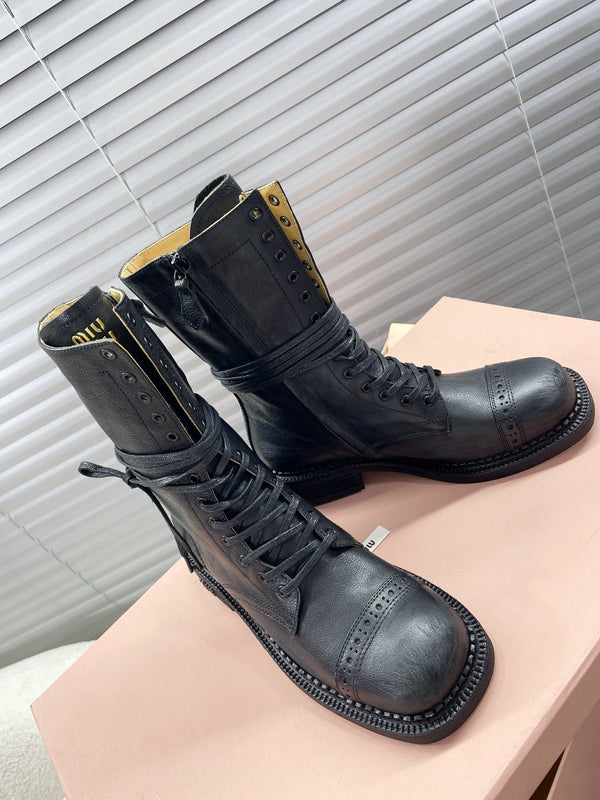 Stivali corti Miu in pelle di vitello nero opaco