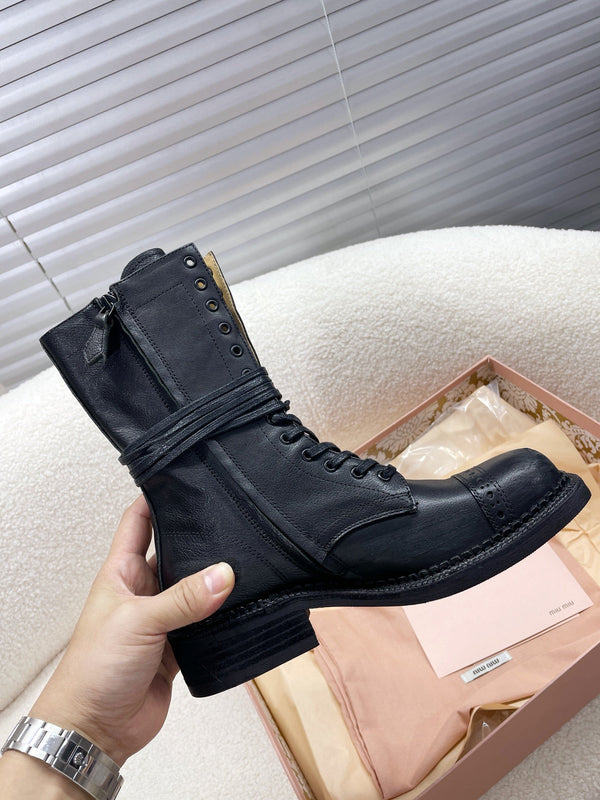 Stivali corti Miu in pelle di vitello nero opaco