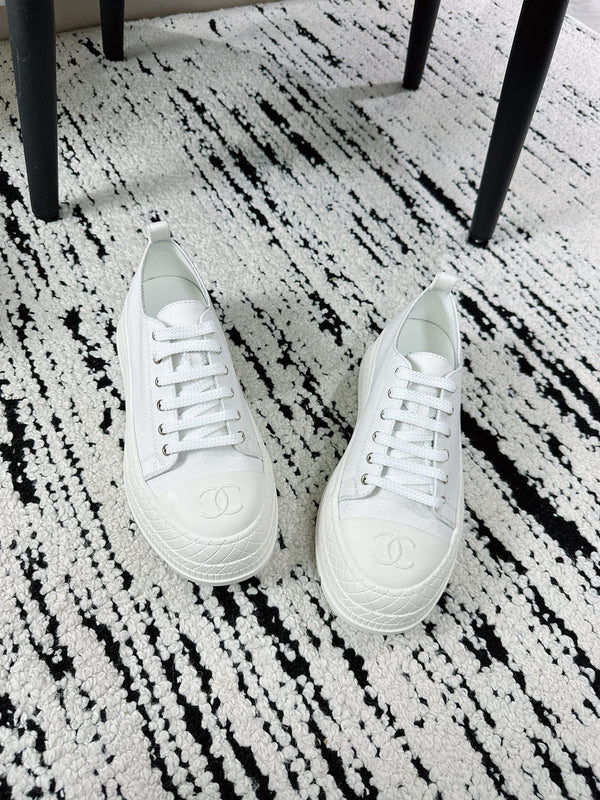 Baskets montantes CC en coton blanc et caoutchouc 696672
