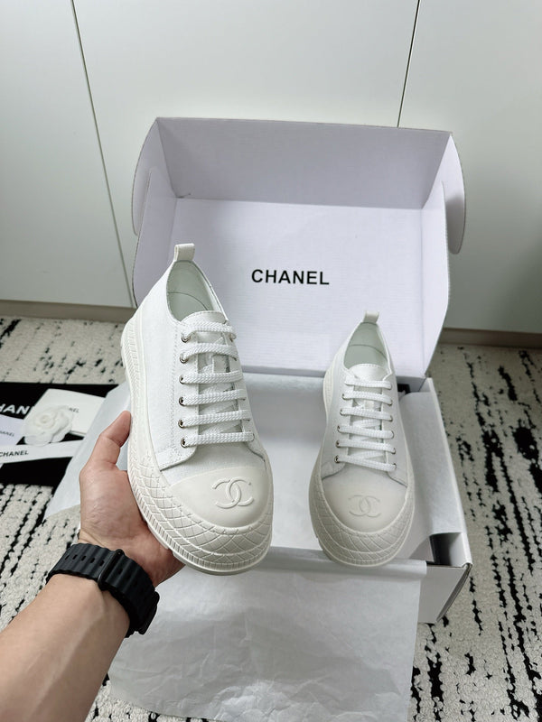 Baskets montantes CC en coton blanc et caoutchouc 696672