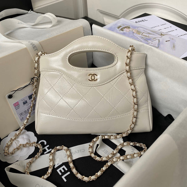 cc 24s31 borsa shopping nano 17,5 cm pelle di agnello crema hardware dorato