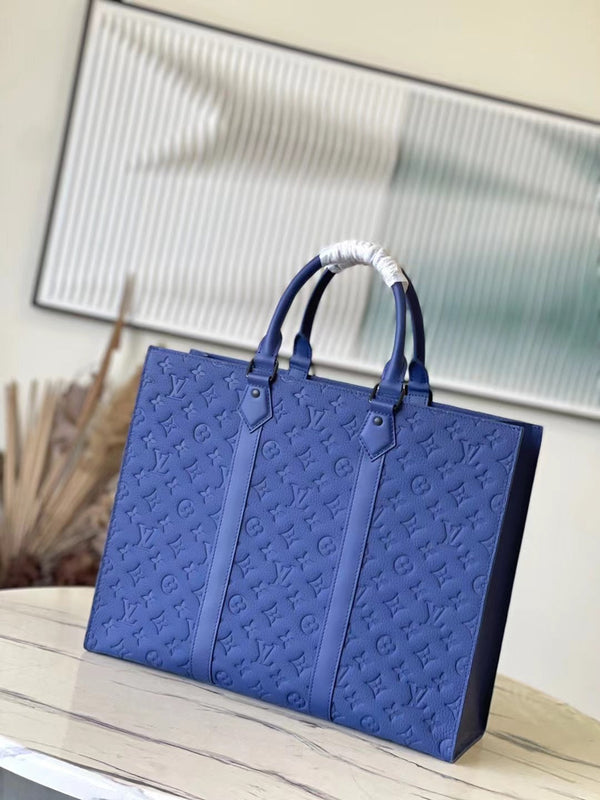 SAC PLAT 24H 41 IN TAURILLON CON MONOGRAMMA IN RILIEVO BLU ZAFFIRO
