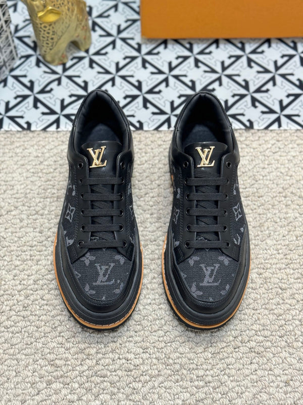 LV TRAINERS IN BLACK CALFSKIN AND JACQUARD