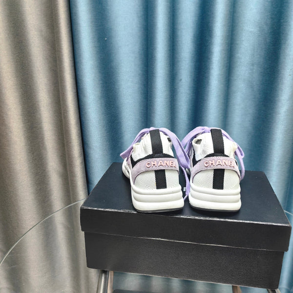 Sneaker CC in pelle scamosciata viola chiaro e tessuto a rete in poliestere