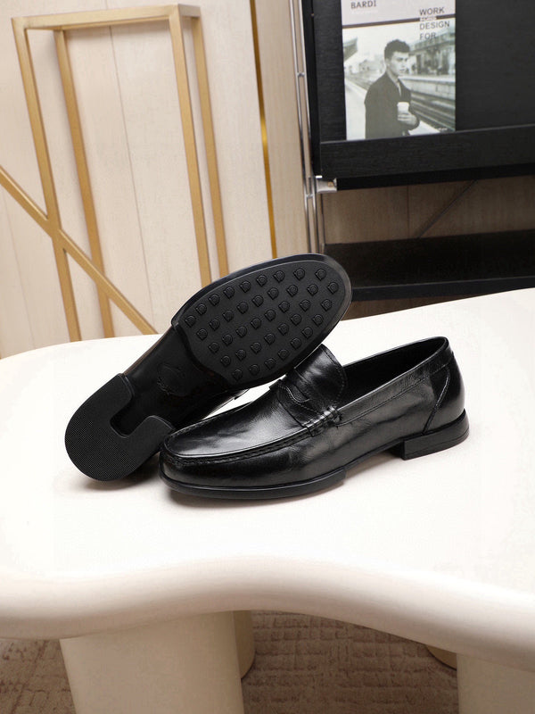 Mocassino da uomo GG in pelle di vitello nera 525162