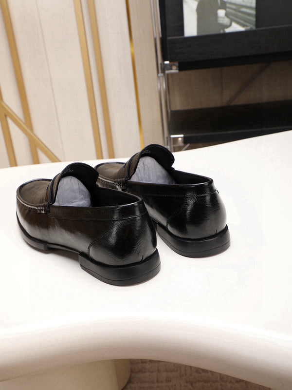 Mocassino da uomo GG in pelle di vitello nera 525162