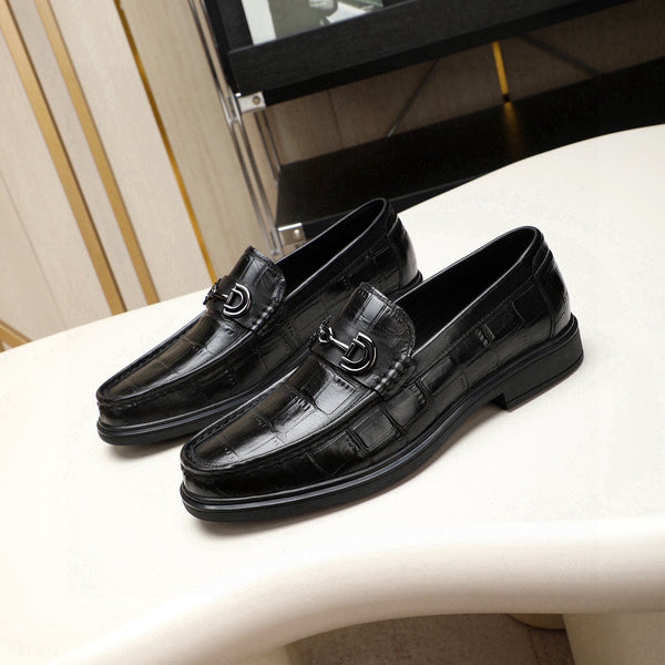 Mocassino da uomo GG in pelle di vacchetta goffrata nera 525165