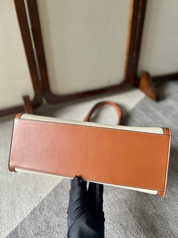 CABAS 37 IN TELA BIANCA E BORDI IN PELLE DI VITELLO BRONZO CON CHIUSURA ORO