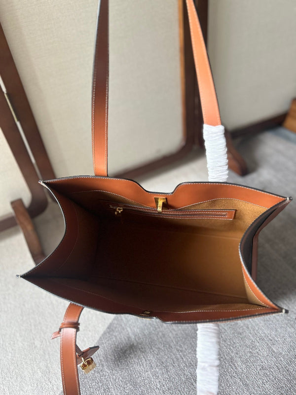 CABAS 37 IN TELA TRIOMPHE NERA E BORDI IN PELLE DI VITELLO MARRONE BRONZO CHIUSURA ORO