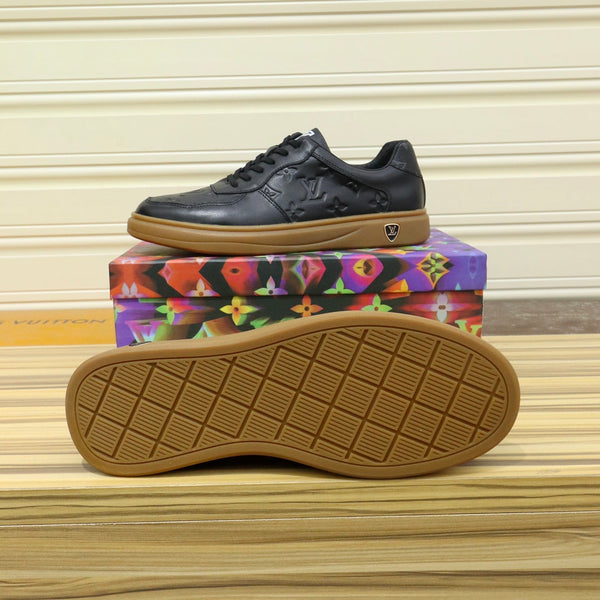 LV TRAINERS IN BLACK CALFSKIN AND BROWN RUBBER