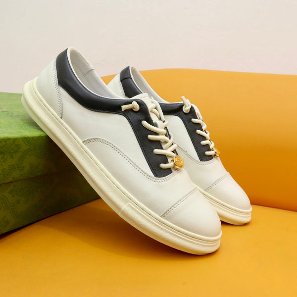 Sneaker da uomo GG in pelle di vacchetta nera e bianca 522970