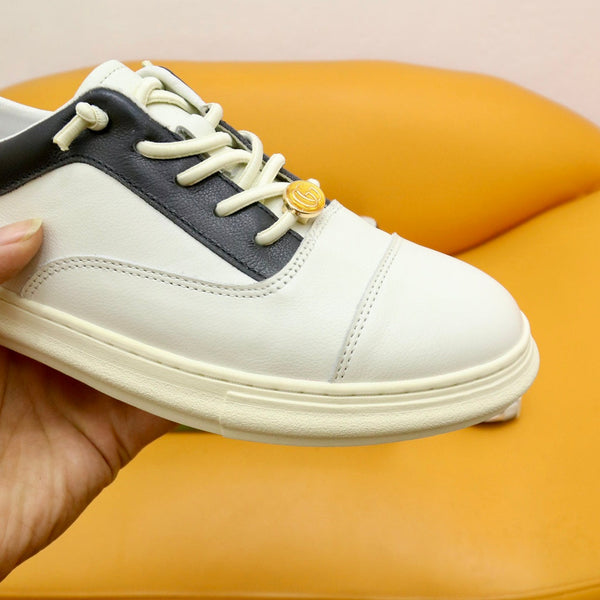 Sneaker da uomo GG in pelle di vacchetta nera e bianca 522970