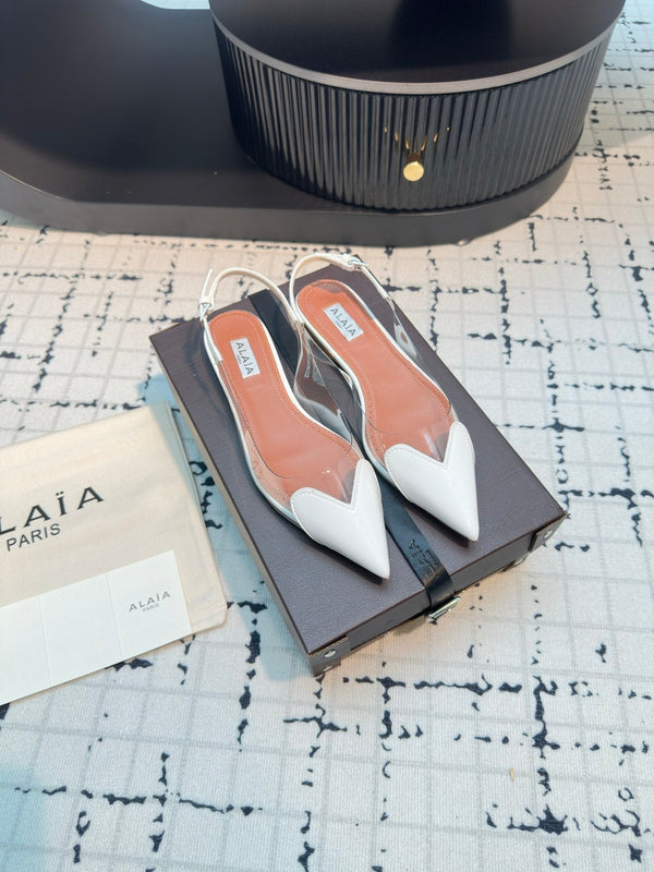 ALAIA FLAT SLINGBACK IN WHITE PATENT CALFSKIN AND FILM