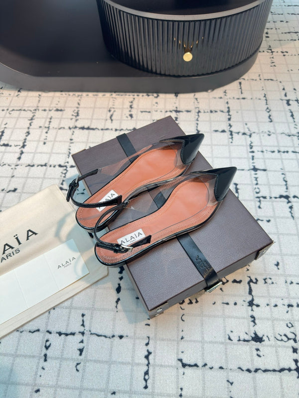 ALAIA FLAT SLINGBACK IN BLACK PATENT CALFSKIN AND FILM