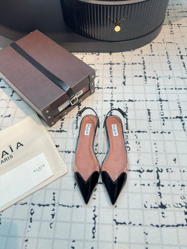 ALAIA FLAT SLINGBACK IN BLACK PATENT CALFSKIN AND FILM