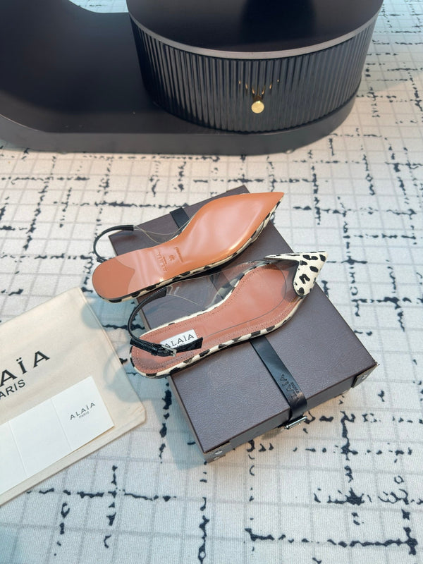 ALAIA FLAT SLINGBACK IN BLACK MIX WHITE PATENT CALFSKIN AND FILM