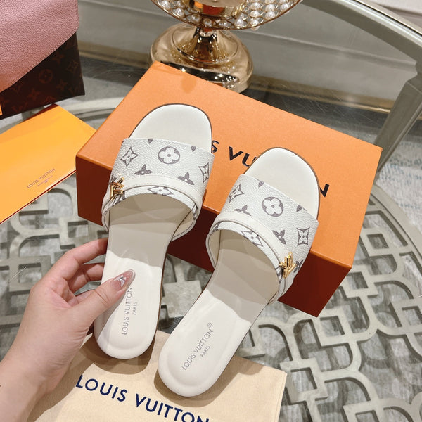 lv sandal isola flat mule cream monogram calfskin