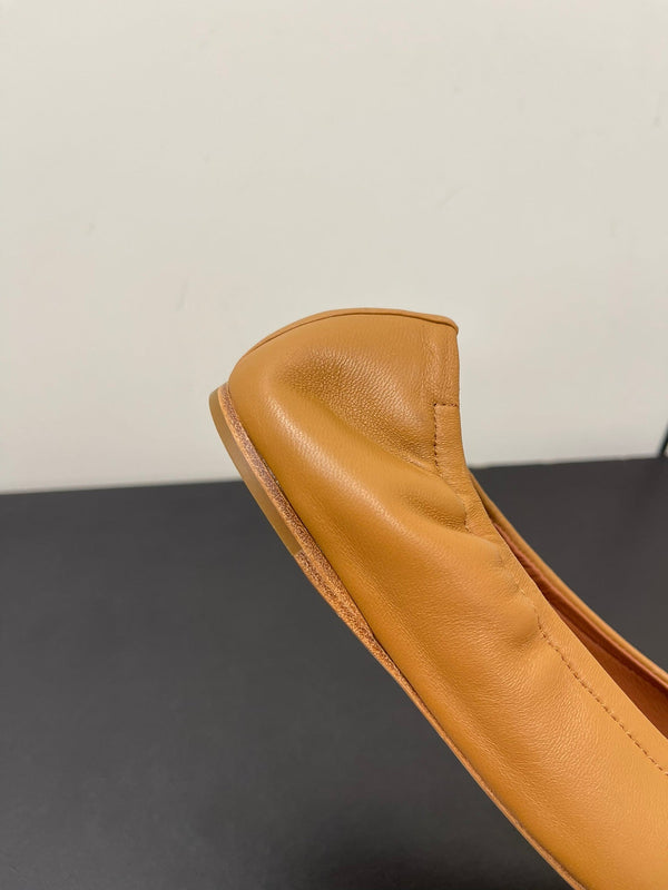 ALAIA BALLET FLATS IN COPPER BROWN SMOOTH CALFSKIN
