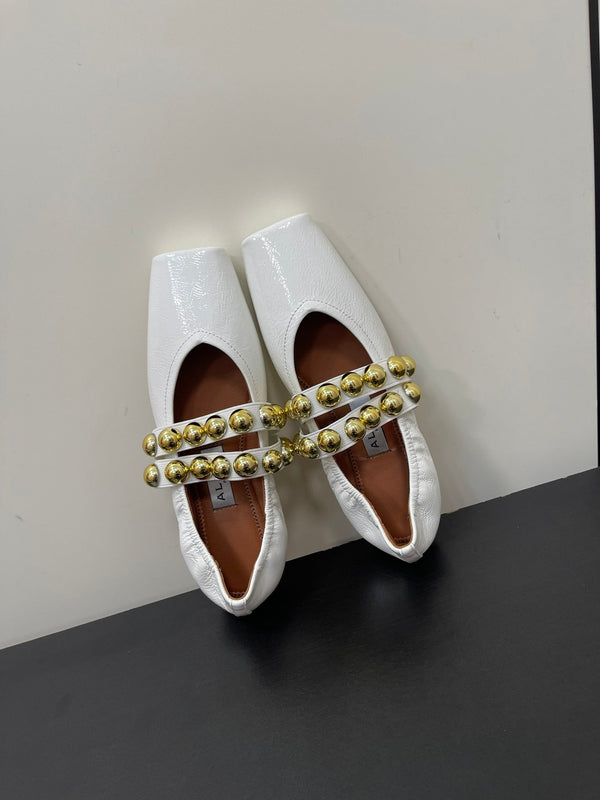 ALAIA BALLET FLATS IN WHITE GLOSSY CALFSKIN WITH GOLD HARDWARE