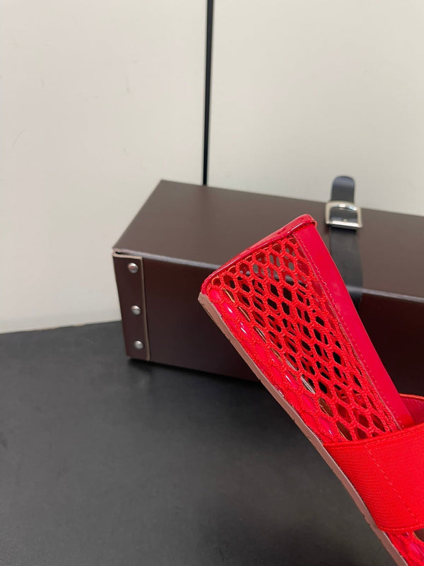 ALAIA BALLET FLATS IN CHERRY RED MESH FISHNET WITH GOLD HARDWARE