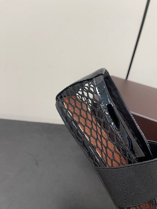 ALAIA BALLET FLATS IN BLACK MESH FISHNET WITH GOLD HARDWARE