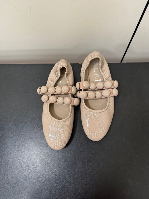 ALAIA SPHERE BALLET FLATS IN ALMOND BEIGE LAMBSKIN