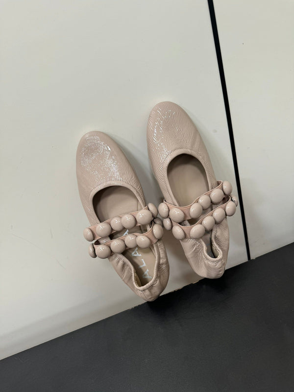 ALAIA SPHERE BALLET FLATS IN ALMOND BEIGE LAMBSKIN