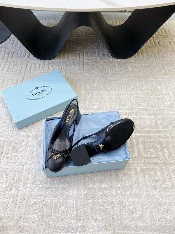 TRIANGLE LOGO SLINGBACK PUMPS WITH BOW IN BLACK CALFSKIN