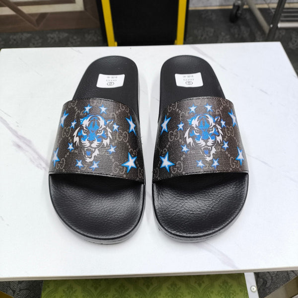 Ciabatte GG Tiger da uomo in pelle di pecora nera 535381