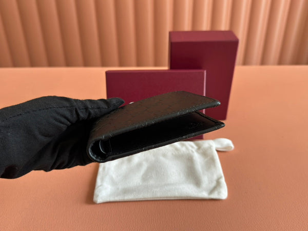 Portafoglio Gucci in pelle goffrata nera 248405