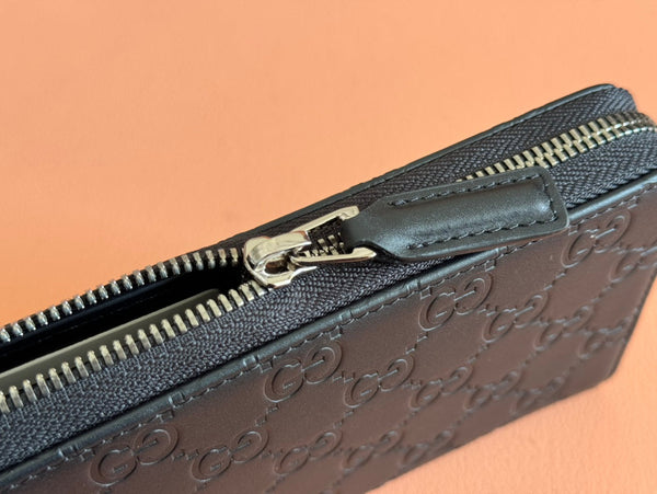 Gucci Zipper Wallet Black Embossed 248406