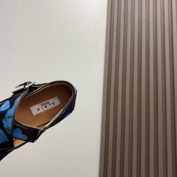 Alaila Criss Cross Ballet Flats In Black Lambskin 996063