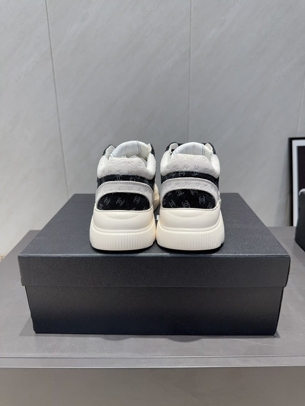 Chanel 25 Sneaker Black White Suede 540329