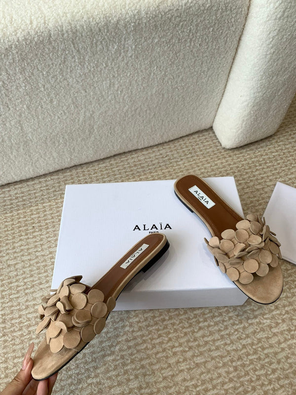 MULE PIATTA ALAIA IN CAMOSCIO BEIGE CREMA
