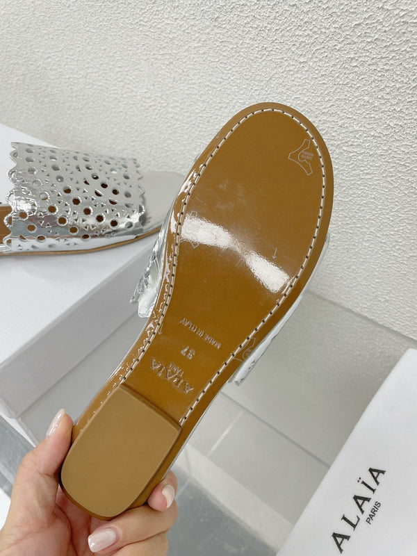 MULES PIATTI ALAIA VIENNE IN AGNELLO ARGENTO