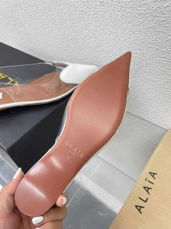 ALAIA LE COEUR FLAT SLINGBACKS IN WHITE PATENT LAMBSKIN