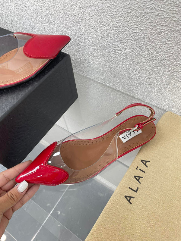 ALAIA LE COEUR FLAT SLINGBACKS IN CHERRY RED PATENT LAMBSKIN