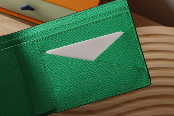 Portafoglio multiplo LV M30995 in tela monogramma verde e pelle Taïga 180059