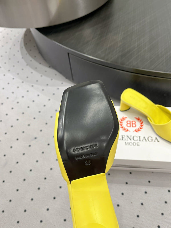 SQUARE-TOE MEDIUM HEEL MULES IN YELLOW CALFSKIN LOGO EMBOSSED