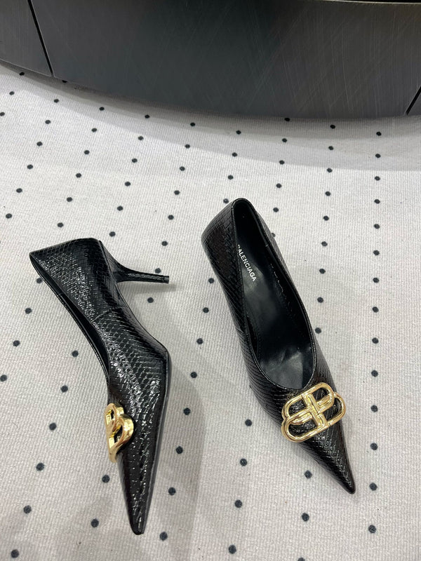 HEELED PUMPS 65 MM IN BLACK LIZARD PATTERN CALFSKIN GOLD HARDWARE