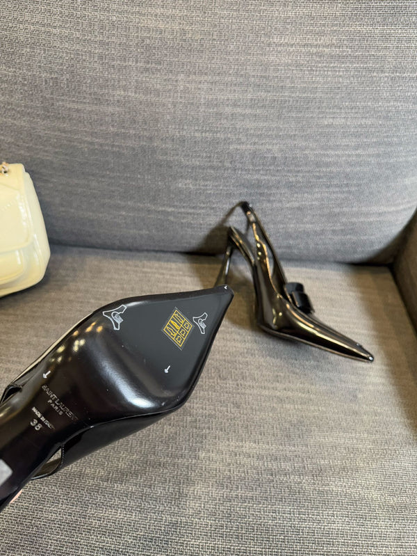 POINTED-TOE SLINGBACK PUMPS IN BLACK SHINY CALFSKIN