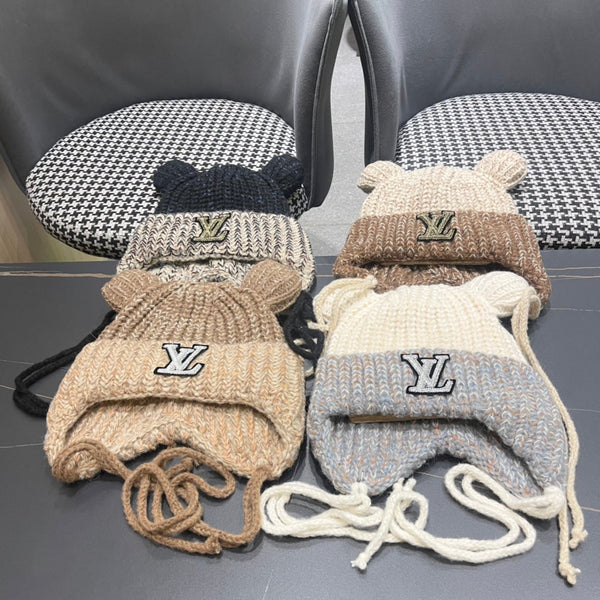 BERRETTO IN MAGLIA CON ORECCHIE CARINE IN LANA GRIGIO MISTO BIANCO 403484