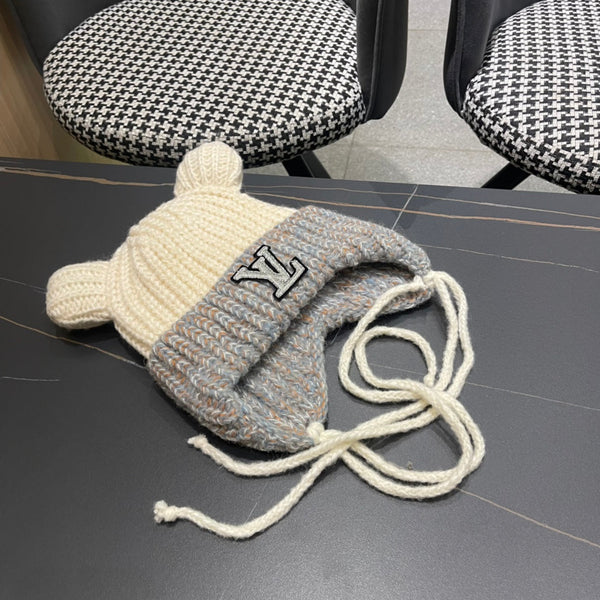 BERRETTO IN MAGLIA CON ORECCHIE CARINE IN LANA GRIGIO MISTO BIANCO 403484