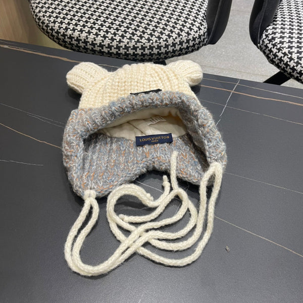 BERRETTO IN MAGLIA CON ORECCHIE CARINE IN LANA GRIGIO MISTO BIANCO 403484