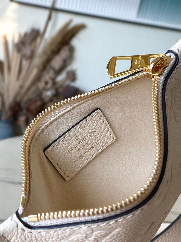 PACCO 28 IN PELLE CREMA CON STAMPA MONOGRAMMA E FERRAMENTA ORO