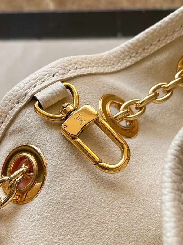 PACCO 28 IN PELLE CREMA CON STAMPA MONOGRAMMA E FERRAMENTA ORO