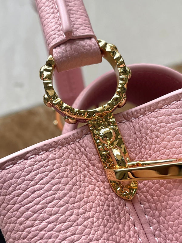 CAPUCINES EAST-WEST MINI 22 IN PELLE DI VITELLO ROSA CIPRIA E FERRAMENTA ORO