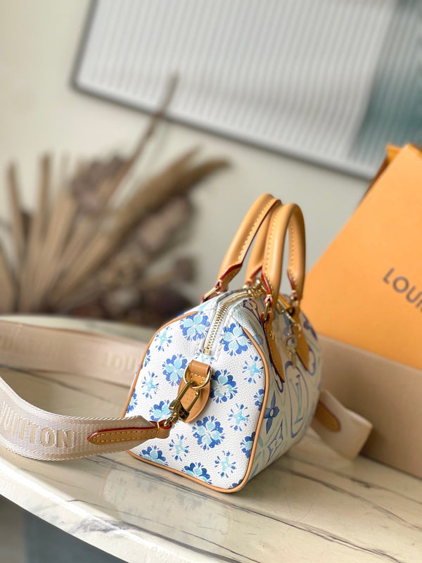 SPEEDY BANDOULIÈRE 20 IN TELA CON PIASTRELLE MONOGRAM BLU LAGUNA E FIBBIA ORO