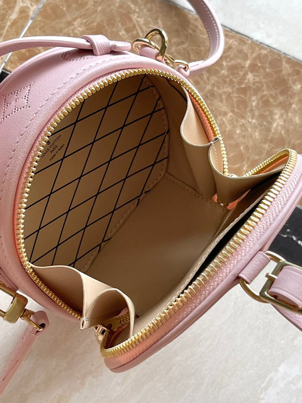 MINI BOITE CHAPEAU 13 IN PELLE DI VITELLO TRAFORATA CON MONOGRAMMA ROSA CHIARO